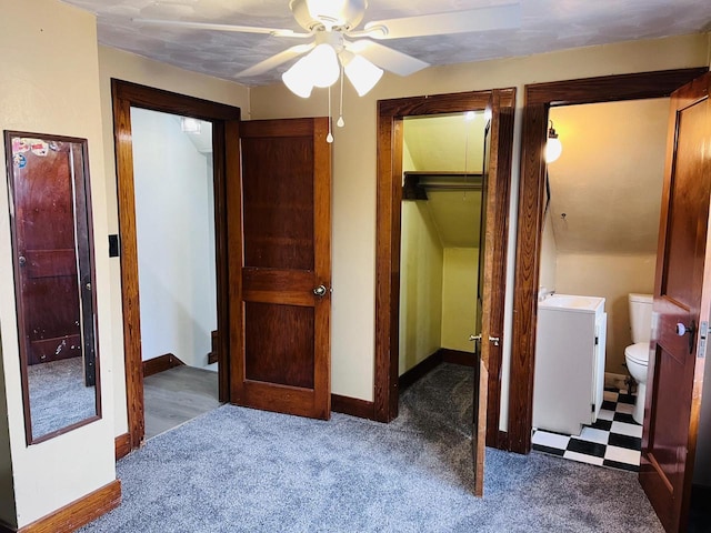 carpeted bedroom with baseboards