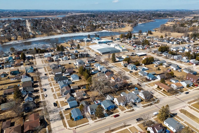 aerial view featuring a residential view and a water view