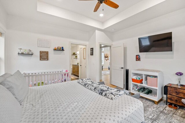 655 Sunset Grn, Bay, WI 54313 - bedroom featuring baseboards, recessed lighting, a ceiling fan, and a tray ceiling