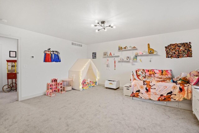 655 Sunset Grn, Bay, WI 54313 - rec room with an inviting chandelier, visible vents, and carpet floors