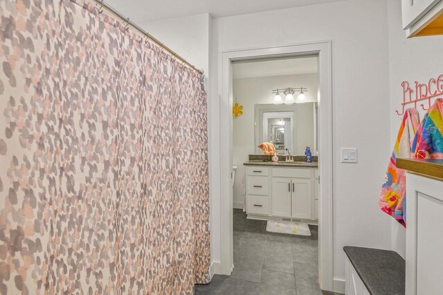 655 Sunset Grn, Bay, WI 54313 - full bathroom with tile patterned floors, a shower with shower curtain, and vanity