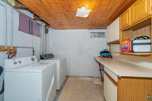 68260 S Bohn St, Iron River, WI 54847 - clothes washing area featuring wood ceiling, cabinet space, and independent washer and dryer