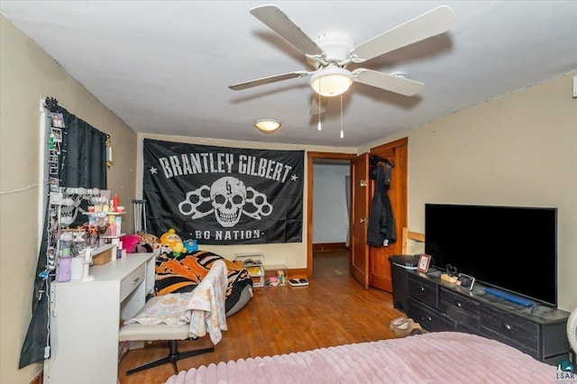 68260 S Bohn St, Iron River, WI 54847 - bedroom featuring wood finished floors and a ceiling fan