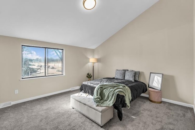 carpeted bedroom featuring visible vents, baseboards, and lofted ceiling