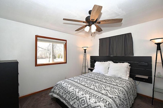 bedroom featuring carpet, baseboards, and ceiling fan