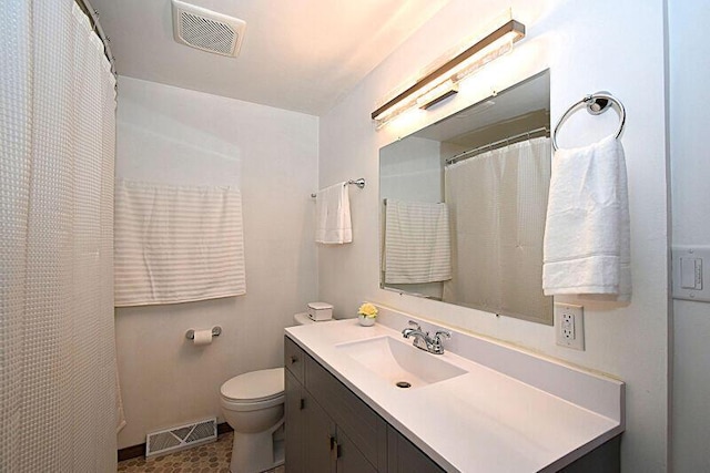 full bath with visible vents, toilet, and vanity