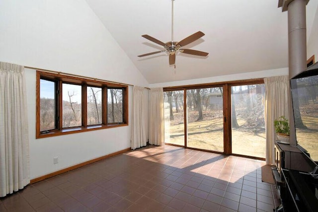 unfurnished sunroom featuring lofted ceiling and ceiling fan