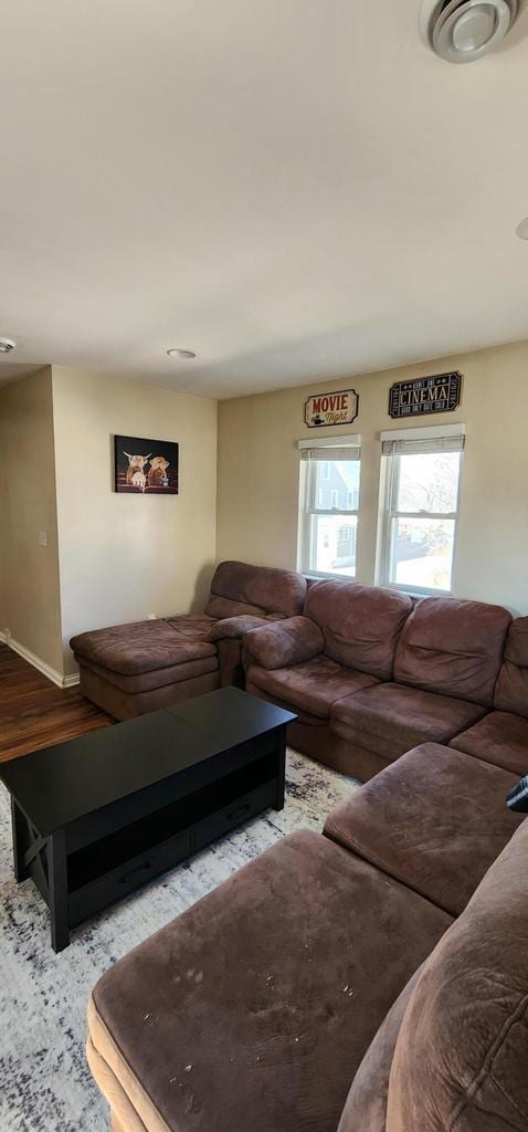 living area with wood finished floors