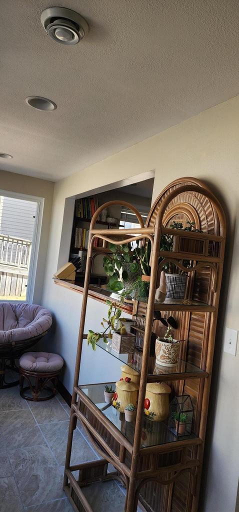 room details with visible vents and a textured ceiling