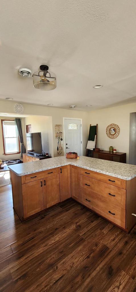 bathroom featuring visible vents and wood finished floors