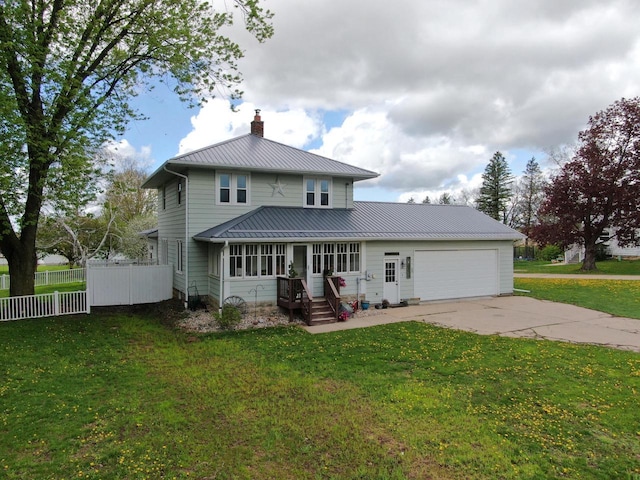 view of front of house featuring driveway, fence, a front yard, a garage, and a chimney