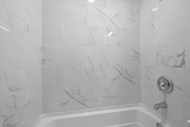 bathroom featuring tub / shower combination