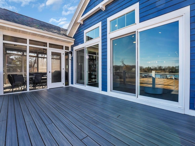 deck with a sunroom