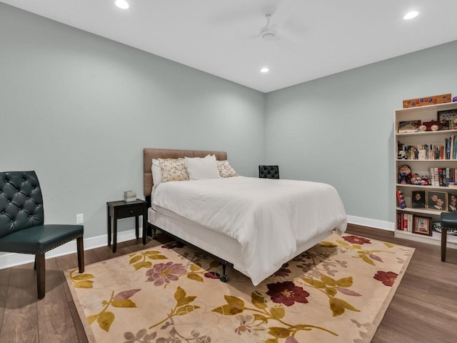 bedroom with recessed lighting, baseboards, wood finished floors, and a ceiling fan