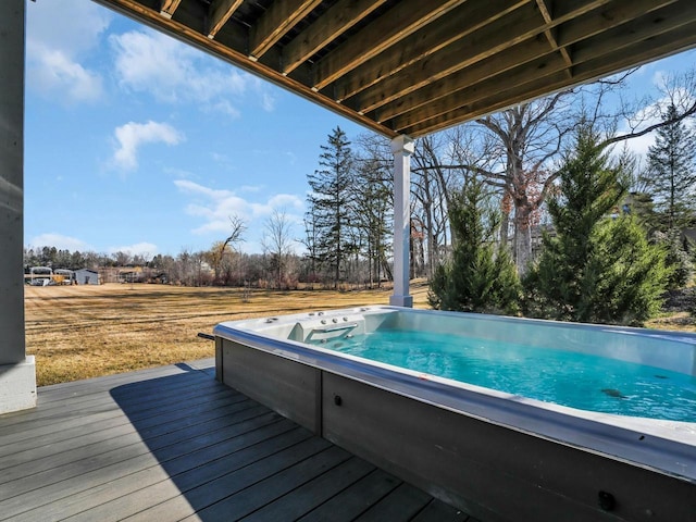 wooden deck with hot tub deck surround