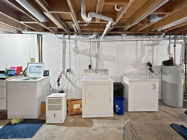 unfinished basement with washer and dryer, refrigerator, and water heater