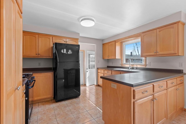 kitchen with black appliances, a sink, dark countertops, a peninsula, and light tile patterned floors