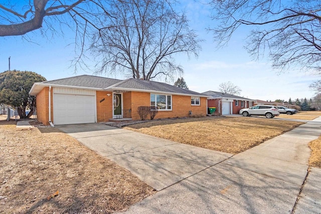 single story home featuring fence, driveway, a front lawn, a garage, and brick siding