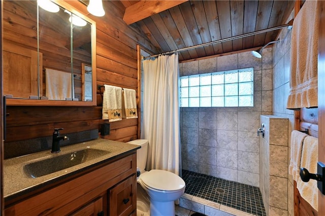 full bath featuring toilet, lofted ceiling with beams, wood ceiling, tiled shower, and vanity