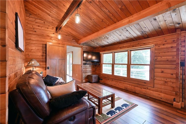 living room with wooden walls, wood ceiling, hardwood / wood-style floors, and vaulted ceiling with beams