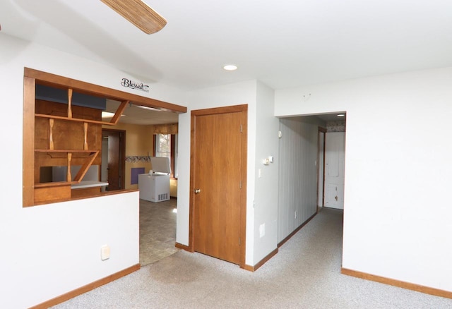 carpeted spare room featuring recessed lighting and baseboards