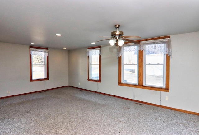 unfurnished room with recessed lighting, baseboards, ceiling fan, and carpet flooring