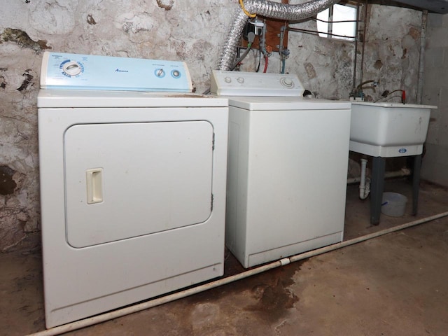 laundry room featuring laundry area and washing machine and clothes dryer