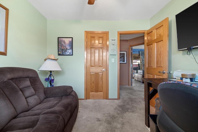 office with ceiling fan, baseboards, and carpet floors