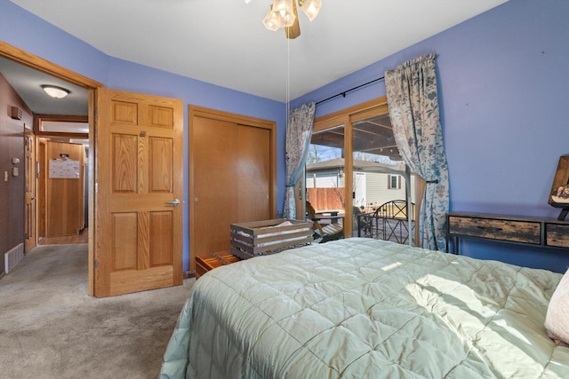 carpeted bedroom with a closet