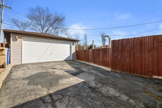 detached garage with fence