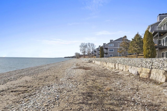 view of water feature with a beach view