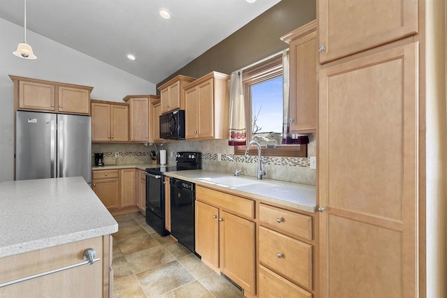 kitchen with black appliances, light brown cabinets, a sink, backsplash, and vaulted ceiling