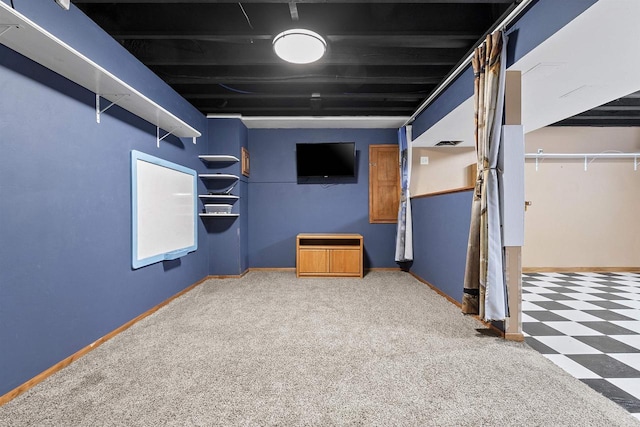 finished basement with visible vents and baseboards