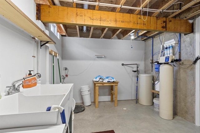 unfinished basement featuring a sink