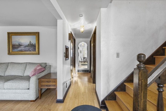 interior space featuring stairway and light wood-style flooring