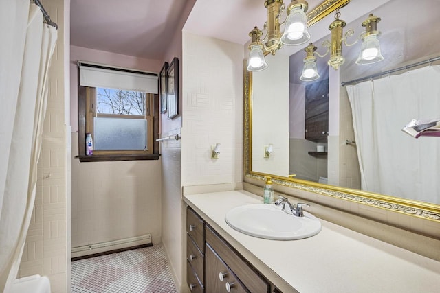 full bath featuring tile walls, a shower with curtain, tile patterned floors, vanity, and a baseboard radiator