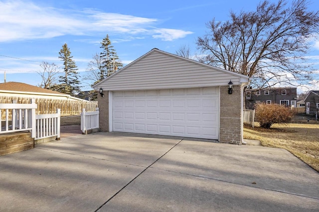 detached garage with fence