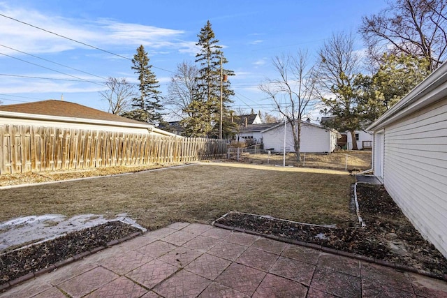 view of yard with a patio area and fence