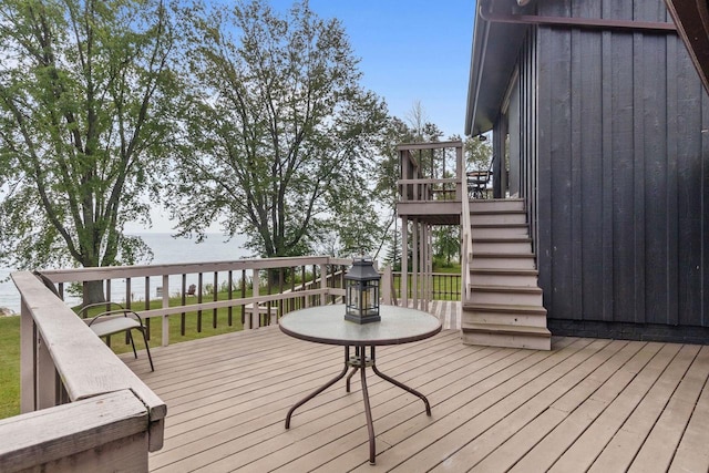 wooden deck featuring stairway