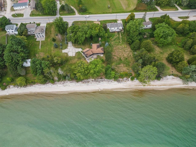 bird's eye view with a water view and a view of the beach