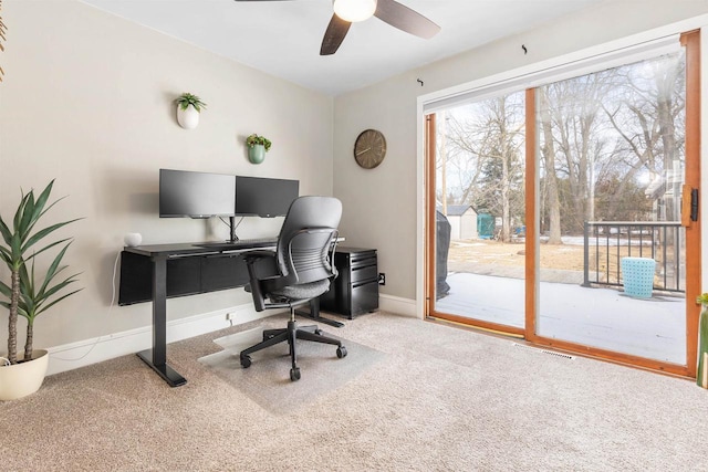 office with baseboards, carpet, and ceiling fan