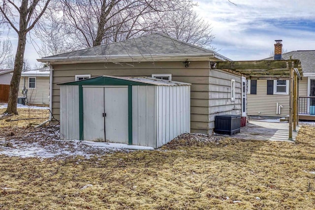 view of shed with a pergola