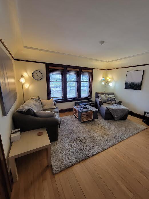 living room with hardwood / wood-style floors