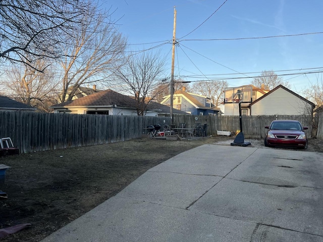 view of yard featuring a patio and a fenced backyard