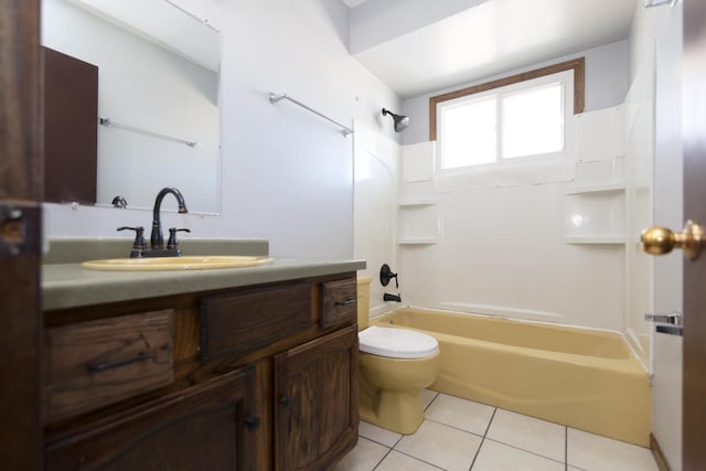 full bath featuring vanity, toilet, washtub / shower combination, and tile patterned flooring