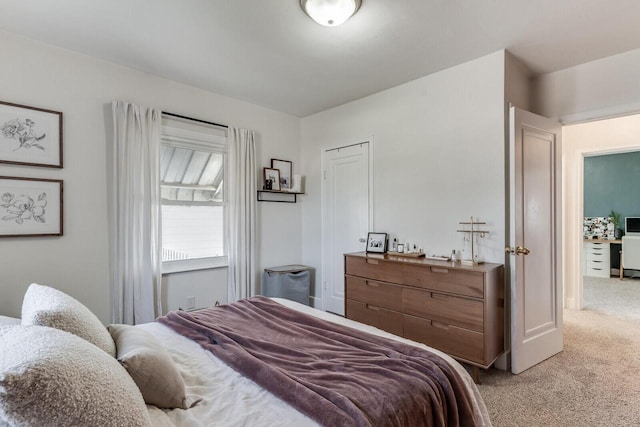 bedroom with light carpet