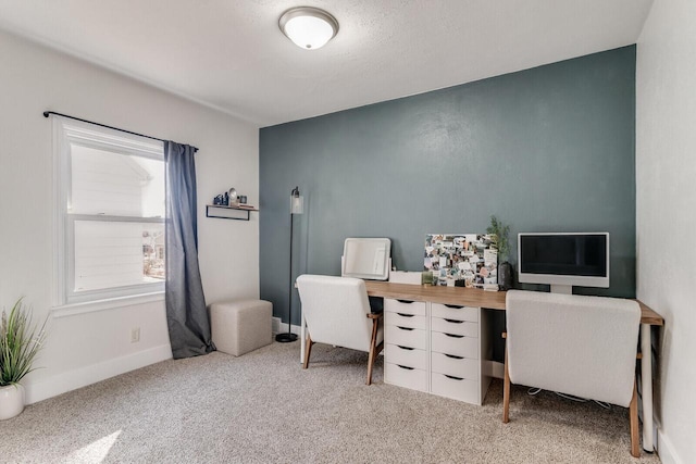 office area with carpet flooring and baseboards