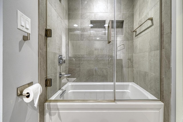 full bathroom featuring combined bath / shower with glass door