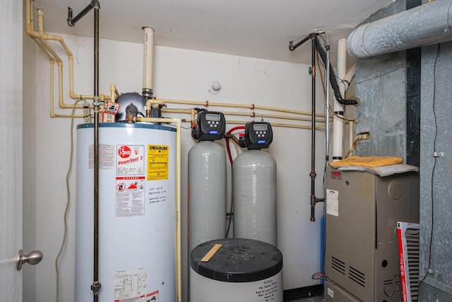 utility room with gas water heater