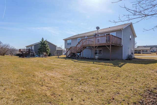 back of house with a deck, central air condition unit, stairs, and a yard